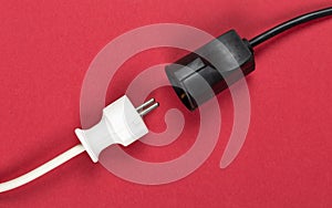 Disconnected white european power cable plug with connector