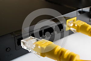 Disconnecting the yellow cable from the router