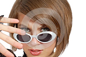 Discontent young woman in sunglasses