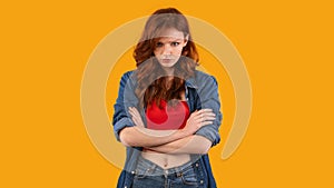 Discontented Millennial Girl Sulking Standing On Yellow Background, Panorama