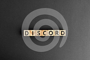 Discord - word from wooden blocks with letters