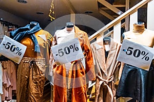 Discounted clothes in a shop window