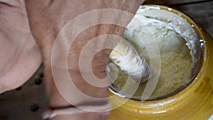Discover Uttarakhand\'s Bilona method: curd churned through bilona to extract butter