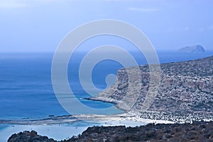 A beautiful stretch of coastline on the blue sea photo