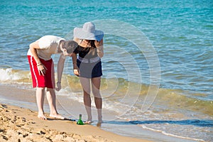 Discovering a bottle on the shore