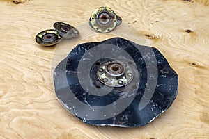 Discs and bearings for a tractor cultivator