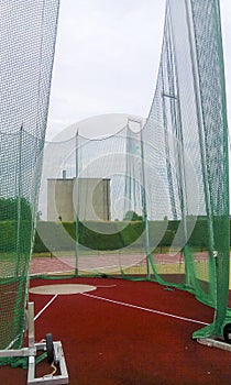 Discus and hummer throwing cage on a stadium photo