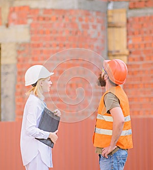 Discuss progress plan. Construction industry concept. Relationships construction client and participant building