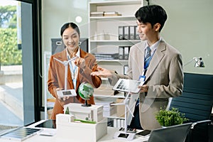 Discussion among businesspeople on the latest developments in solar cell panel technology and Solar Energy