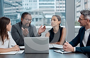 Discussion, meeting and business people with laptop in boardroom for planning, teamwork or review. Diversity