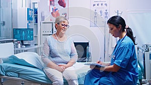 Discussion with nurse in modern hospital