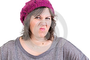 Disdainful woman screwing up her nose