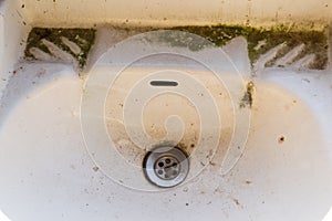 Disgusting old dirty sink close-up