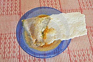 Dish of Amazonian style Fish Soup with Cassave Bread