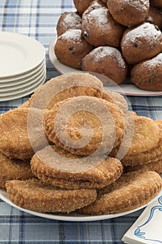 Dish with appelflappen, a traditional Dutch pastry for New Year`