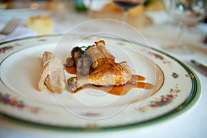 Dish of chicken with hot paprika souce and mushrooms