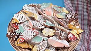 A dish of Christmas gingerbread rotates on the table.