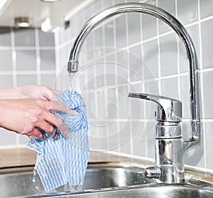 Dish Cloth under running water