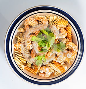 Fresh shrimp dish with spiced butter aldente pasta photo