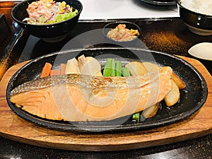 Dish of Grilled rainbow trout fillet steak.