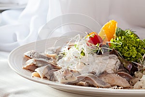 Dish with herring and cream