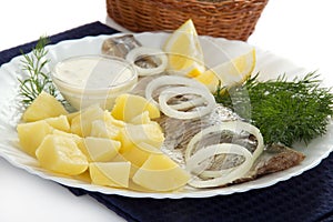 Dish with herring and potatoes