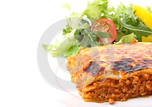 Dish of lasagne isolated