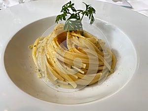 Dish of Linguine Pasta with mullet. Italian restaurant cuisine photo