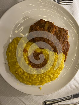 dish with Milanese rice and ossobuco