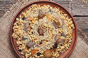 Dish of pilaf, national uzbek spicy meal with meat