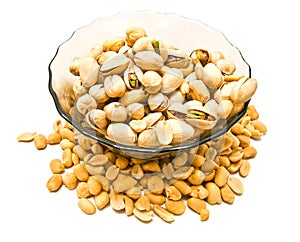 Dish with pistachios and peanuts photo