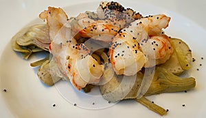 Dish of prawn and artichoke appetizer. Italian cuisine photo
