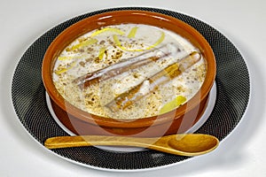 Dish of rice pudding with grated cinnamon