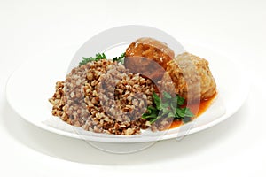 Dish with rissole and buckwheat