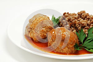 Dish with rissole and buckwheat