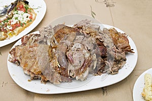 Dish with roast goat meat.  Specialty on island of Samothrace in Greece