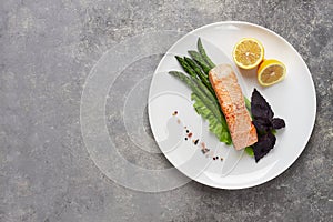 Dish, salmon fillet with asparagus, on a white plate, top view, horizontal, no people,