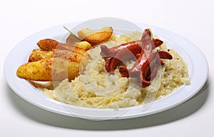 Dish with Sauerkraut Sausages and Potatoes