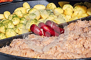 Dish with sausage, cabbage and potatoes