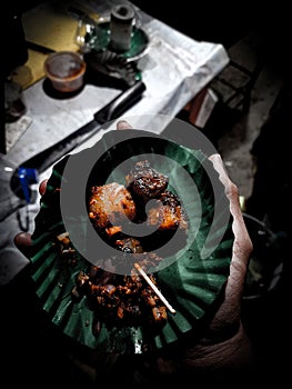 Dish of Smoke Pork grill.. Spiciest dish. The last 3 peices of the plate.. Grill and fried.. Night supper dish..