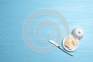 Dish with tasty fresh butter and knife