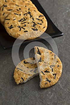 Dish with traditional Japanese rice crackers and seaweed