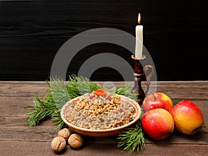Dish of traditional Slavic treat on Christmas Eve. Pine branche