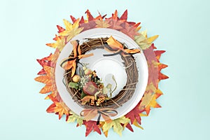 dish with wreaths and autumn leaves decorative