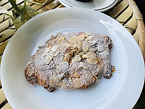 Dish of yummy Crispy almond chocolate croissants.