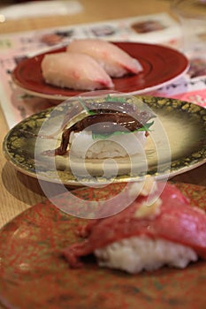 3 Dishes of Delicious Japanese Sushi including raw horseflesh, cuttlefish and flounder