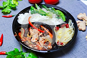 Dishes made from fungus and sliced â€‹â€‹meat. Chinese food. Fungus meat slices. A rice and dish set. Takeaway