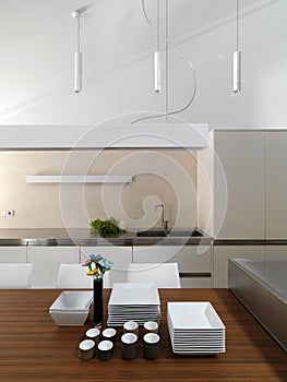 Dishes on the table in modern kitchen