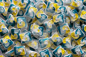 Dishwasher detergent capsules and or laundry soap full frame background.