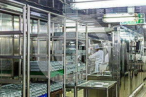 Dishwashing Area with Chef in Background